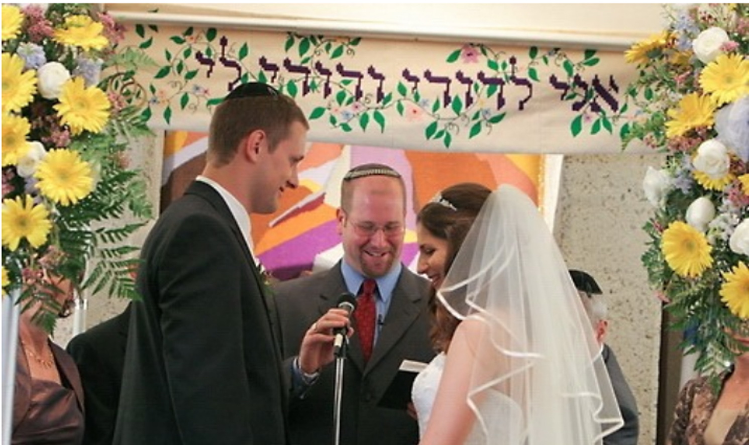 Rabbi Speaks to Wedding Couple